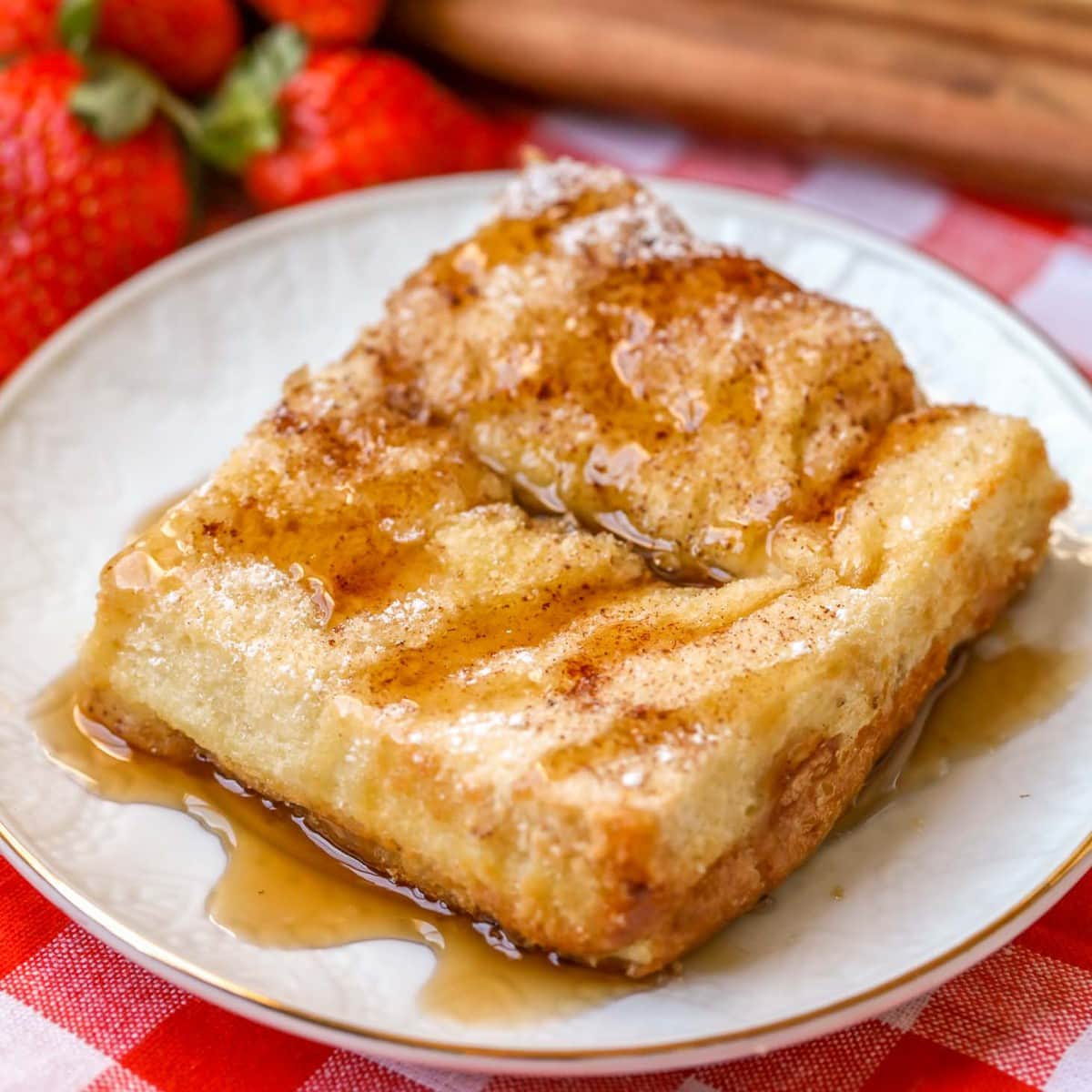 Texas Toast French Toast with syrup on plate.