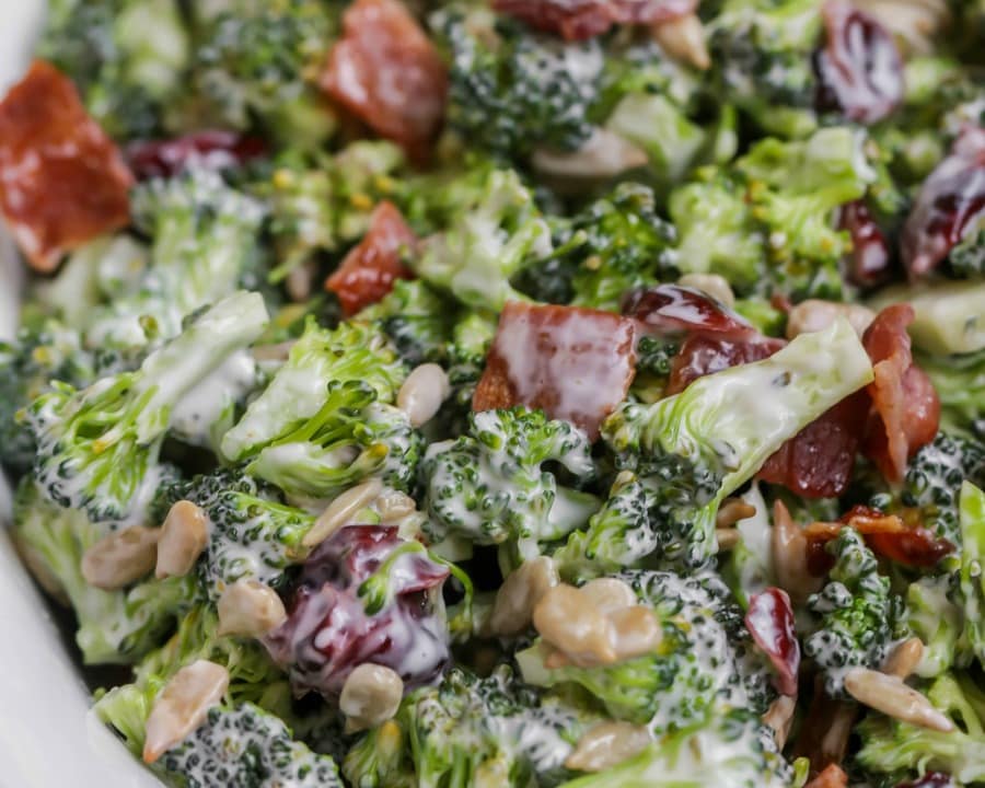 4th of July Recipes - Closeup of broccoli salad in a white bowl. 
