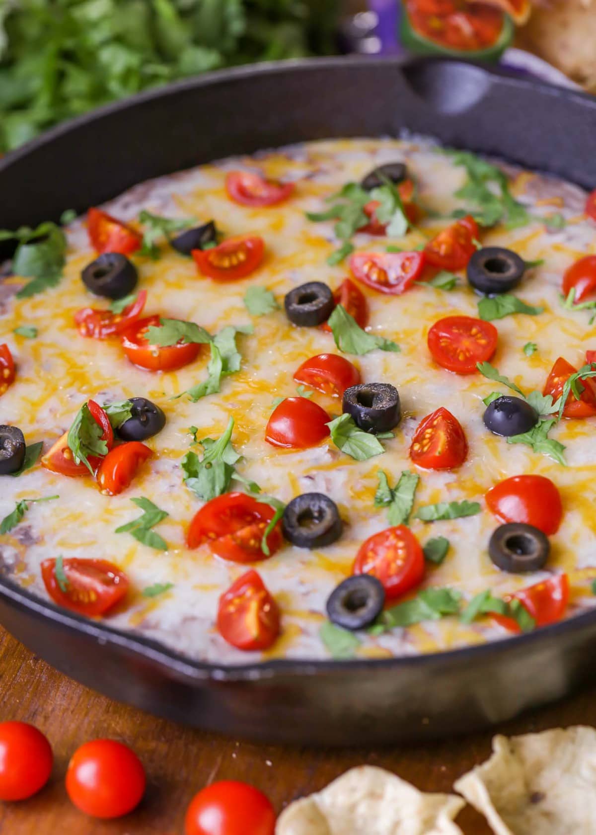 Cheesy and delicious Black Bean Dip in a cast iron skillet
