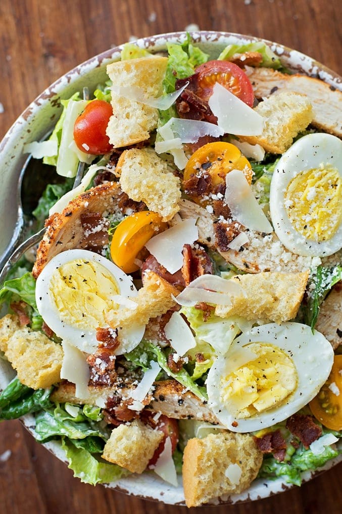 Easy Chicken Caesar Salad recipe served in a bowl.