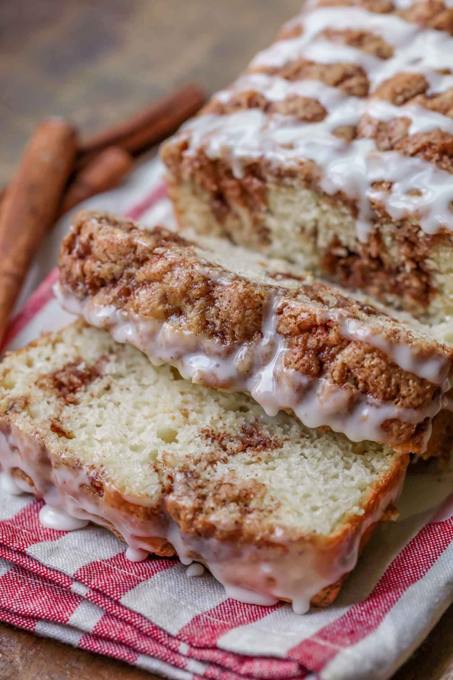 Cinnamon bread sliced and glazed on a tea towel