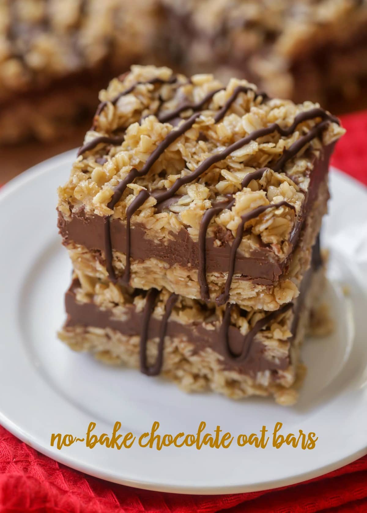 Simple and delicious no bake Chocolate Oat Bars stacked on a white plate