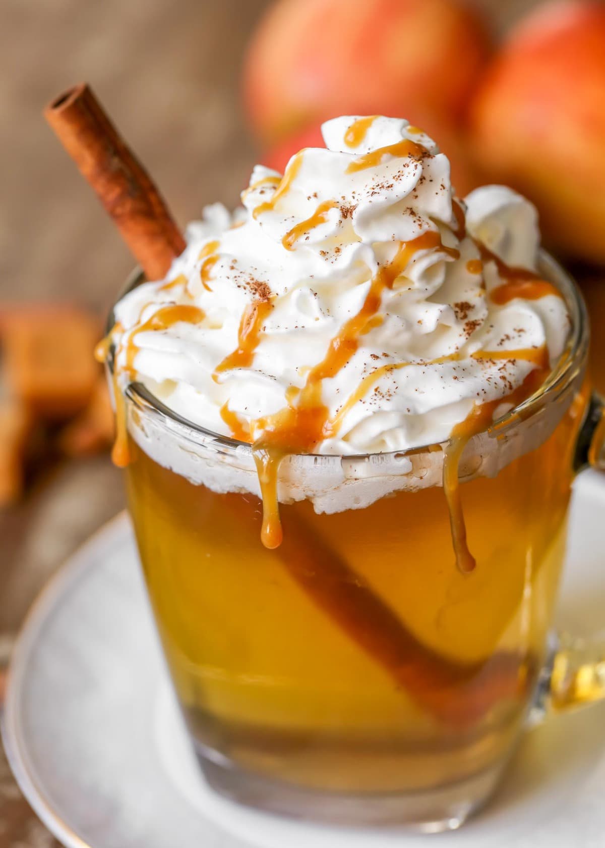 Caramel Apple Cider topped with whipped ream and caramel