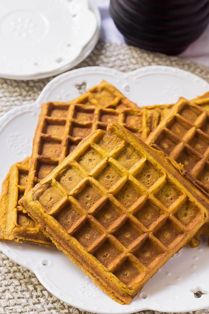 Pumpkin Spice Waffles stacked on a plate