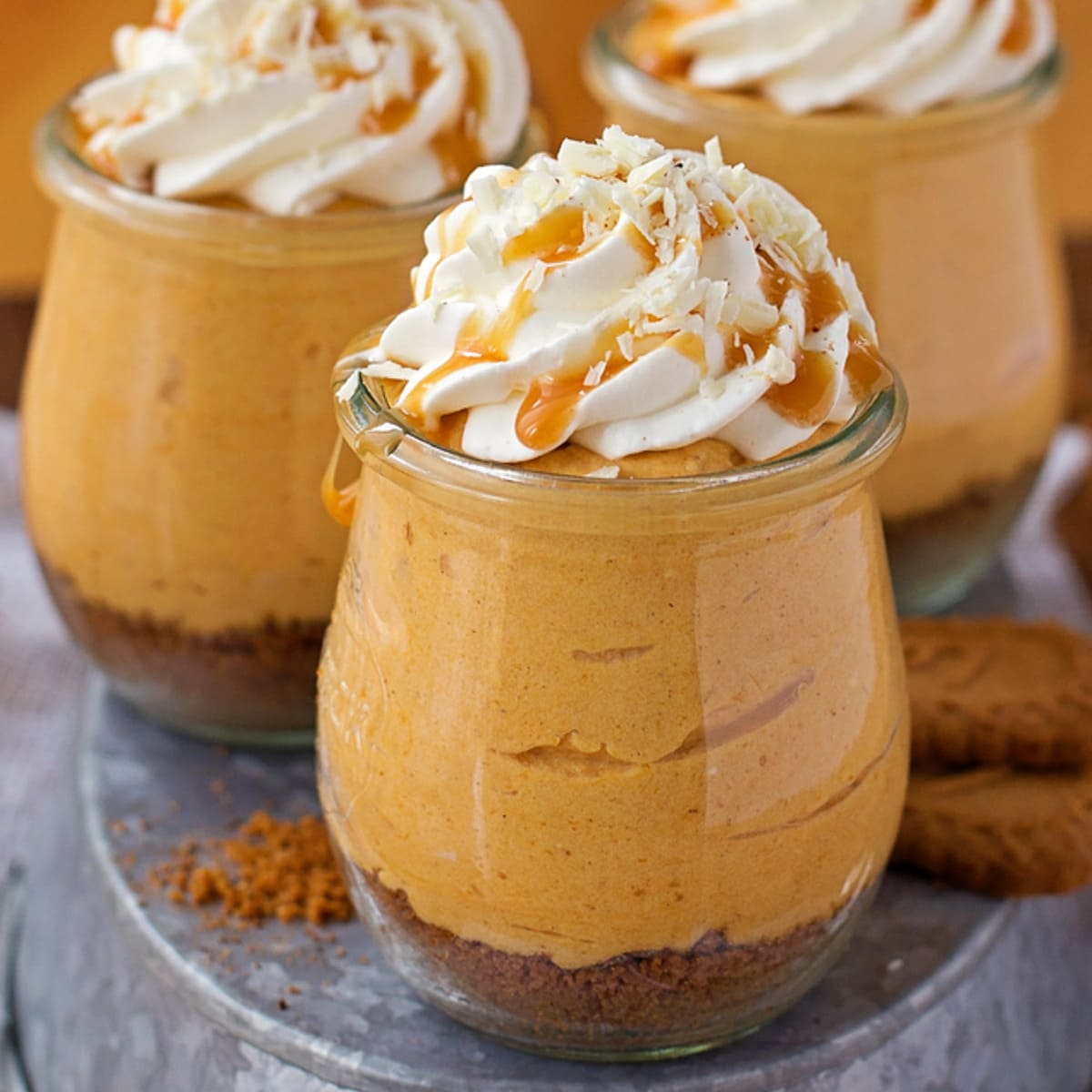 Pumpkin Recipes - No Bake Pumpkin Cheesecakes in individual parfait dishes.