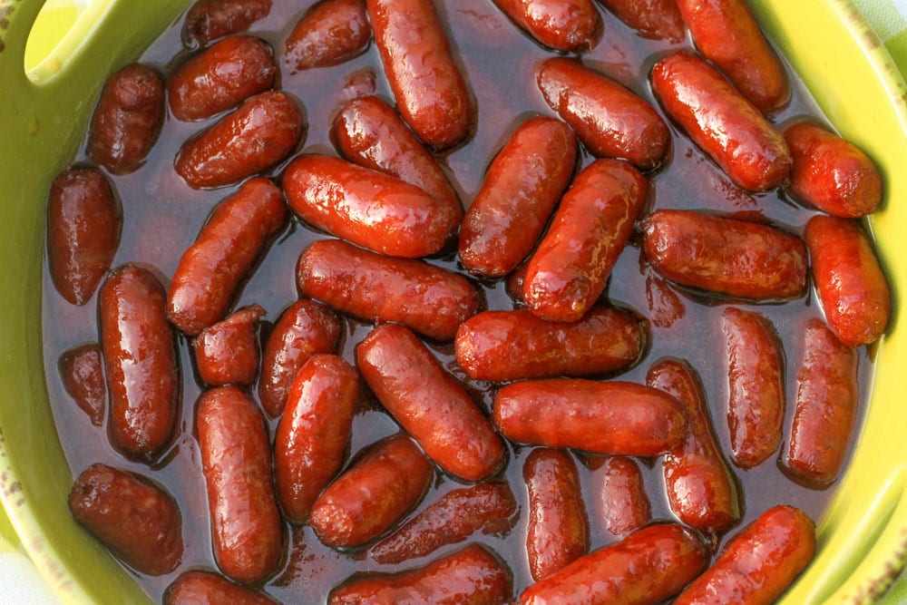 Brown sugar beanie weenies in a serving dish