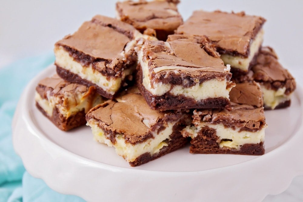 Cheesecake brownies on cake stand