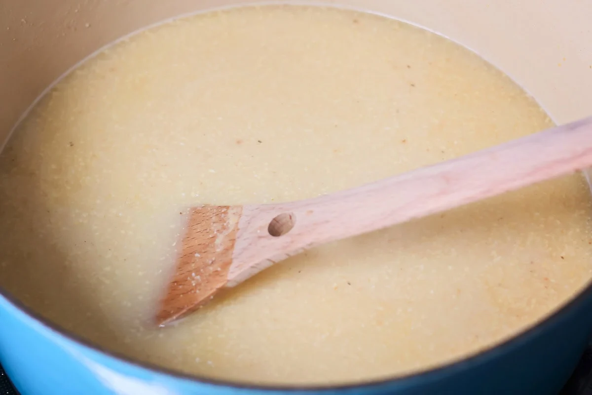 Chicken broth in pot.