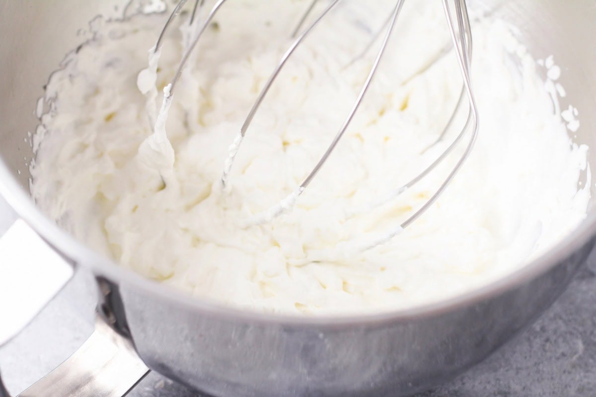 Making whipped cream for coconut cream pie recipe.