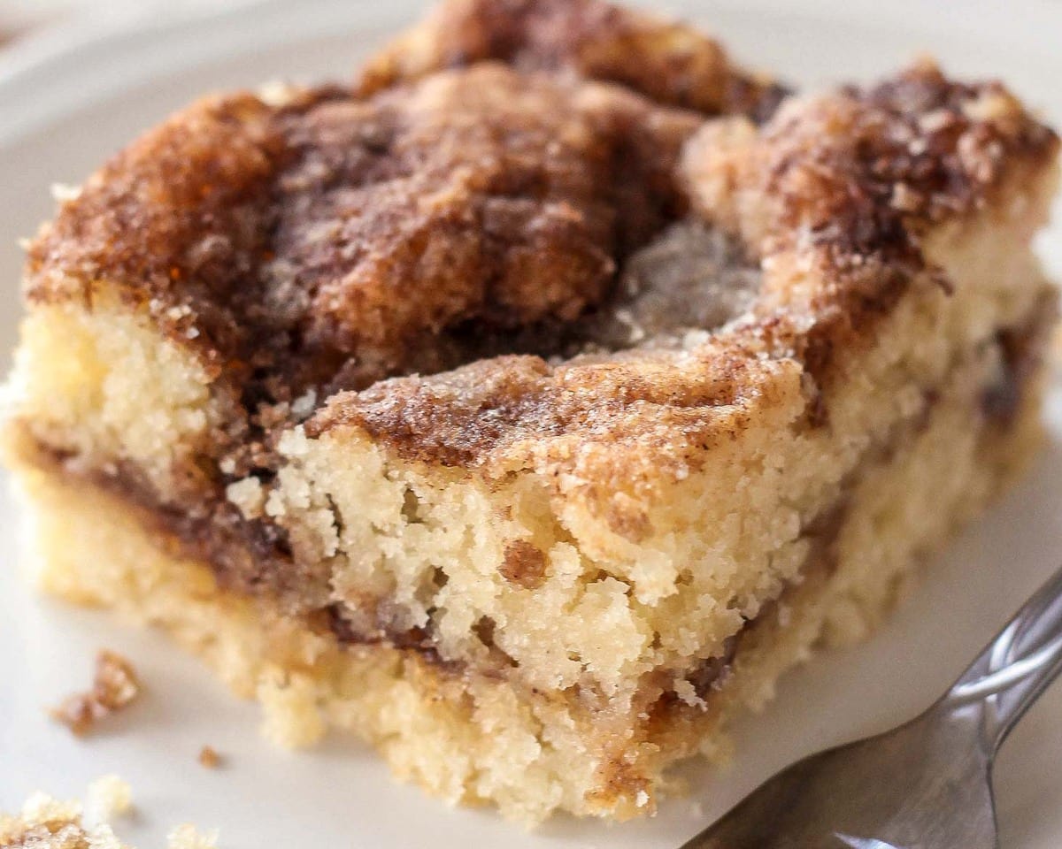 Thanksgiving breakfast ideas - close up of a square slice of coffee cake on a white plate.