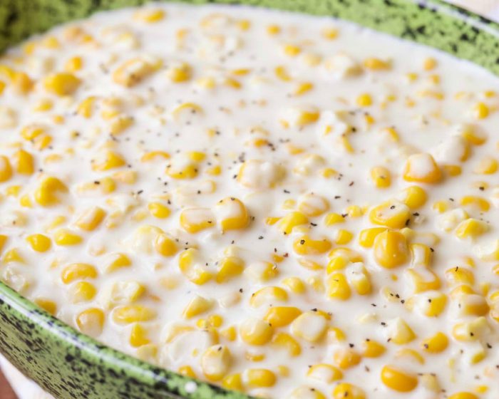 Slow cooker creamed corn in a serving dish