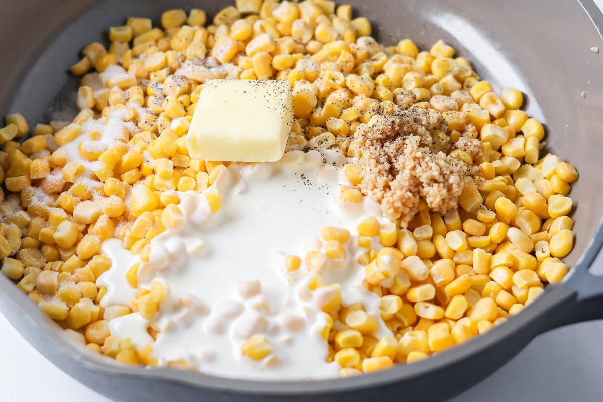 Creamed corn ingredients in skillet.
