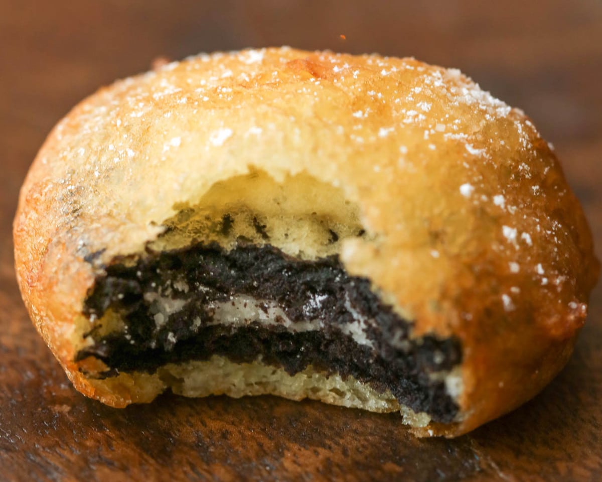 Deep Fried Oreos close up image with bit missing.