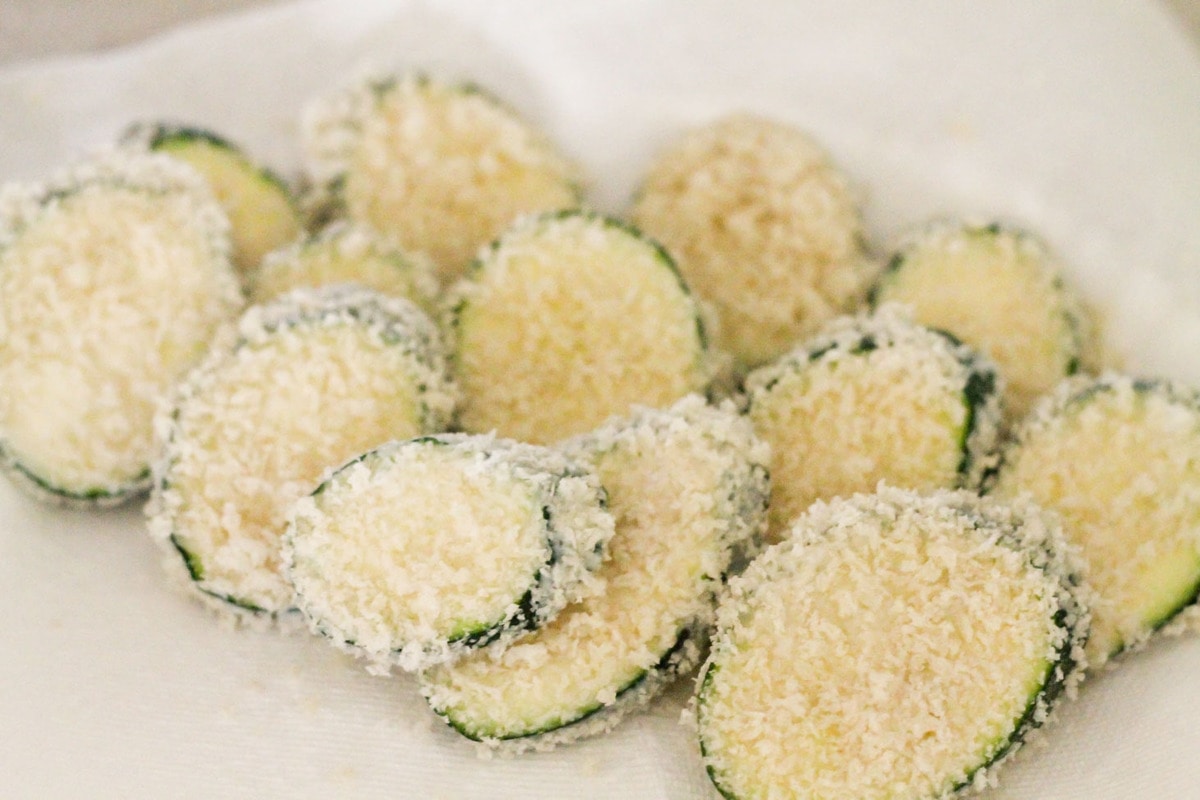 How to make fried zucchini - battered zucchini on plate before frying