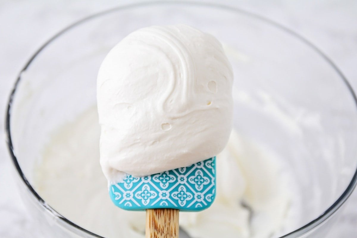 Marshmallow fluff frosting on a spatula