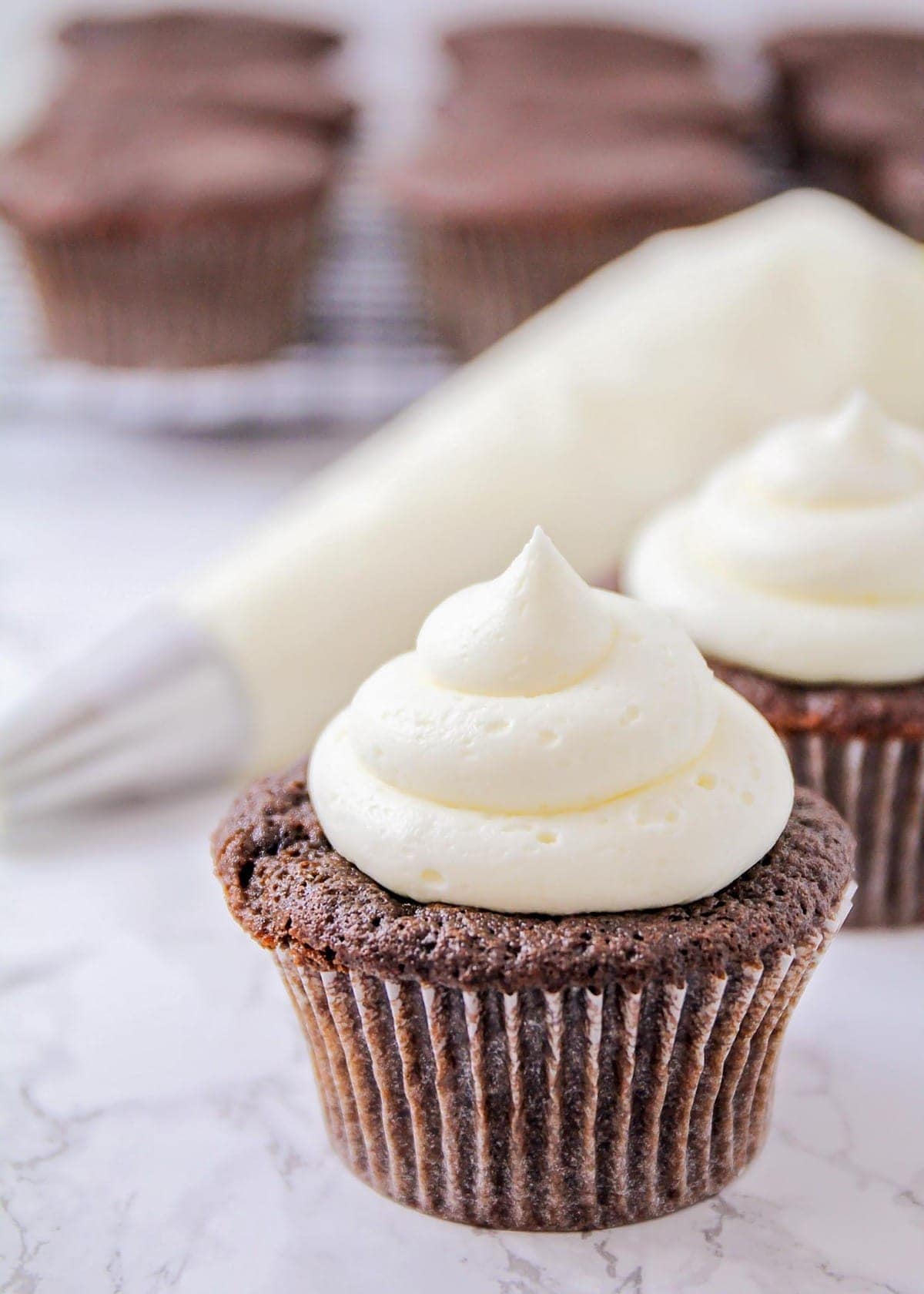 marshmallow frosting on top of a cupcake