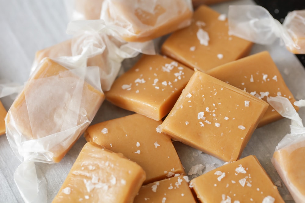 Caramel candies wrapped in wax paper