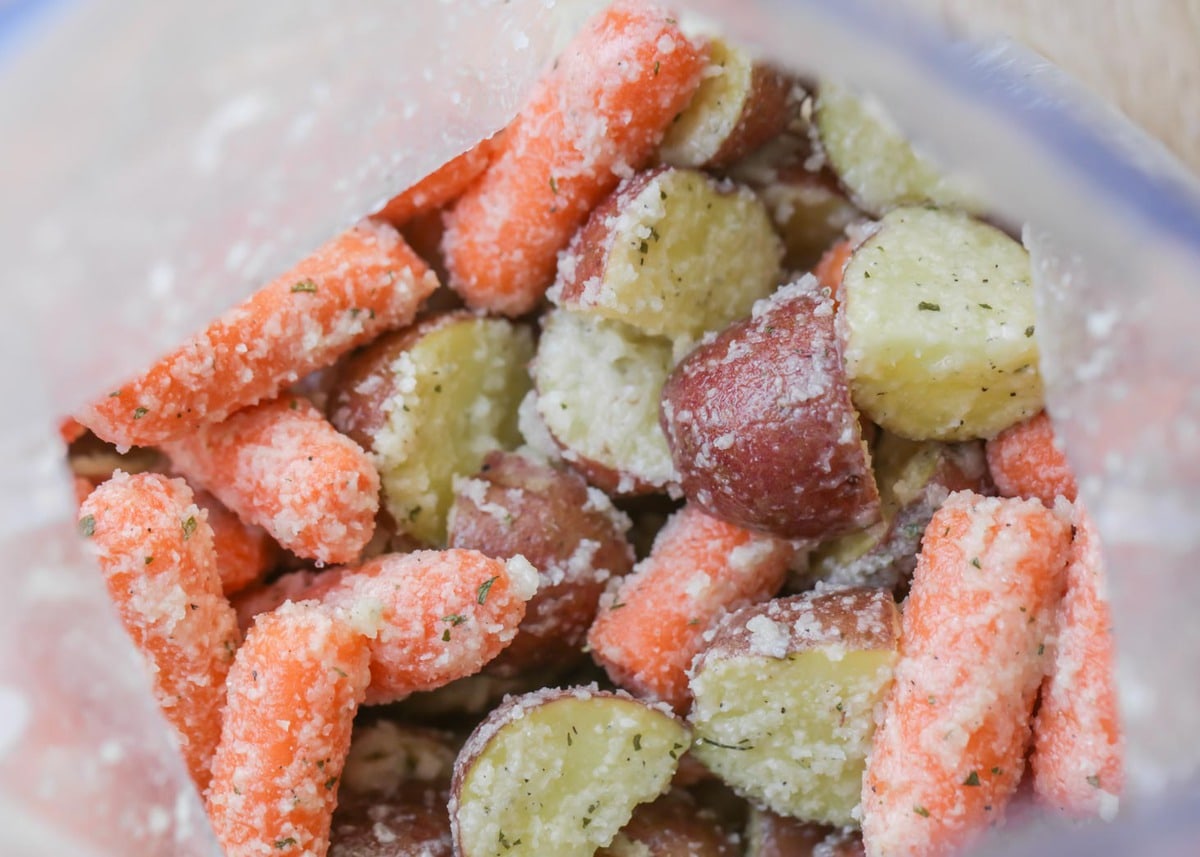 carrots and potatoes in bag coated with ranch seasoning