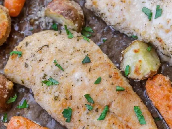 ranch chicken on pan with carrots and potatoes