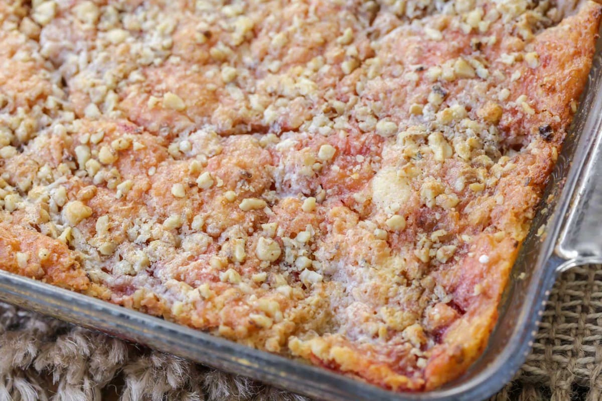 Cherry pineapple dump cake in a casserole dish.