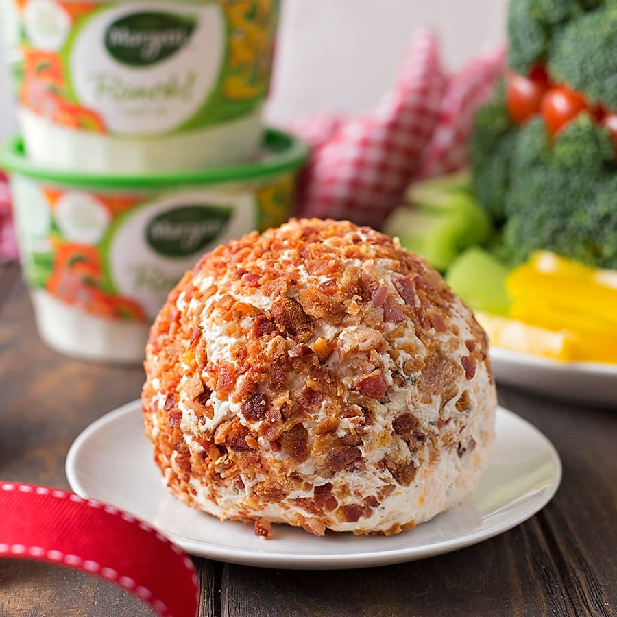 Bacon Ranch Cheese Ball on a white plate.