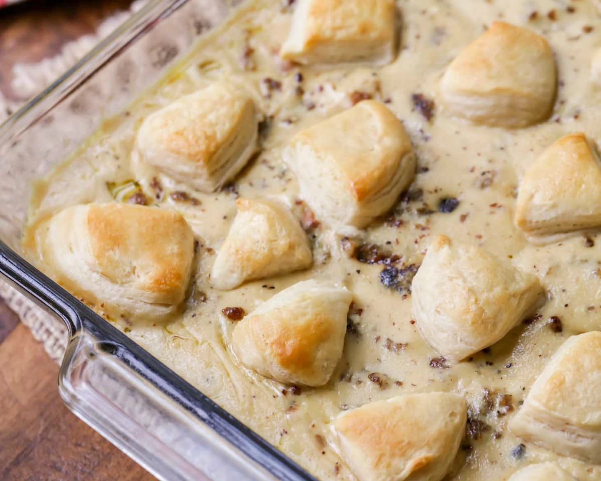 Thanksgiving breakfast ideas - biscuits and gravy casserole in a glass baking dish.