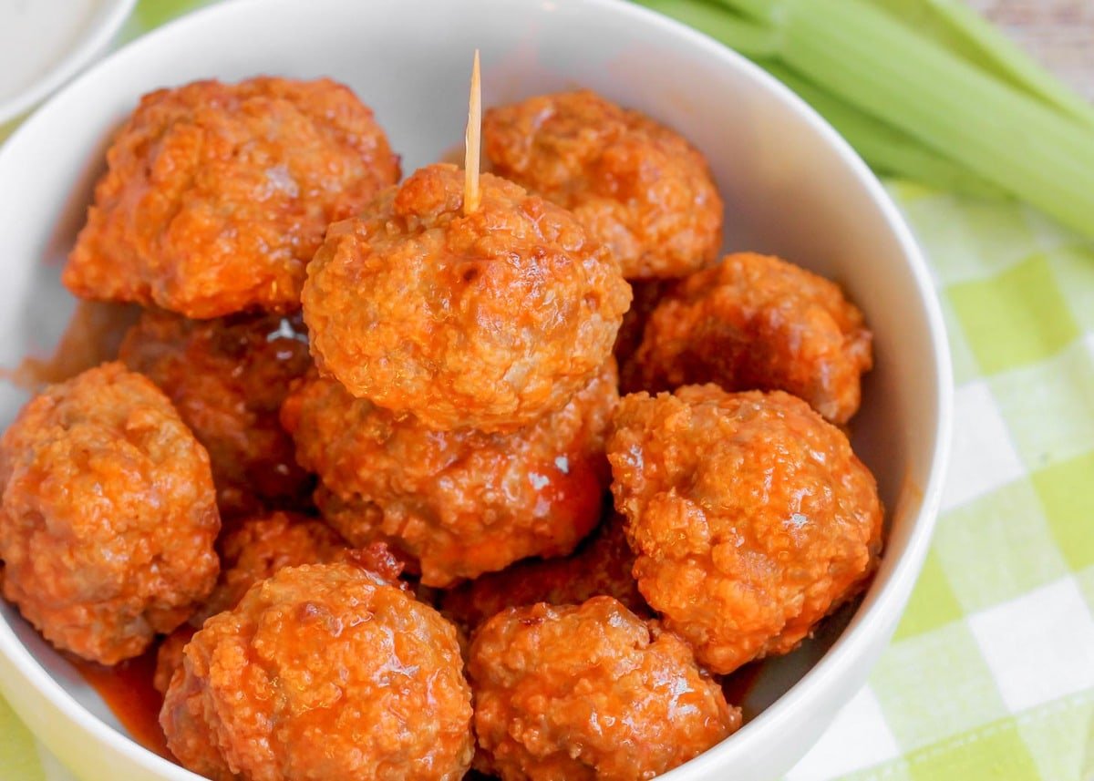 Healthy Appetizers - Buffalo chicken meatballs in a white bowl. 