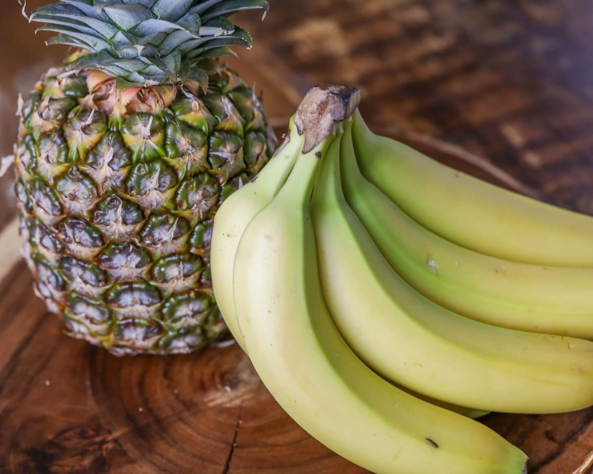 Bananas and pineapple for making a pineapple banana smoothie.