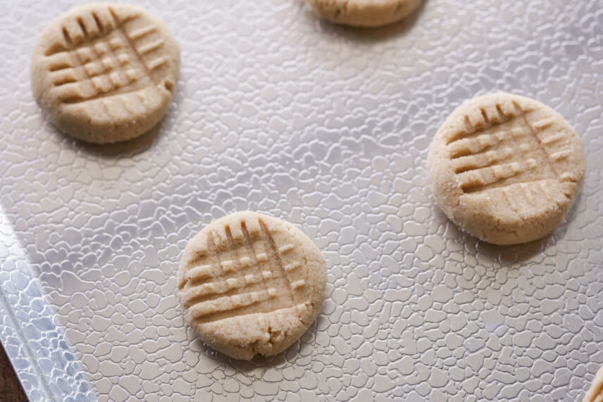 Soft peanut butter cookies on cookie sheet