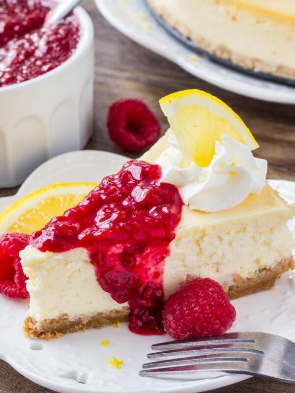 This lemon cheesecake is smooth and creamy with a crunchy graham cracker crust and delicious lemon flavor. Then it's topped with raspberry sauce for the perfect flavor combo. 