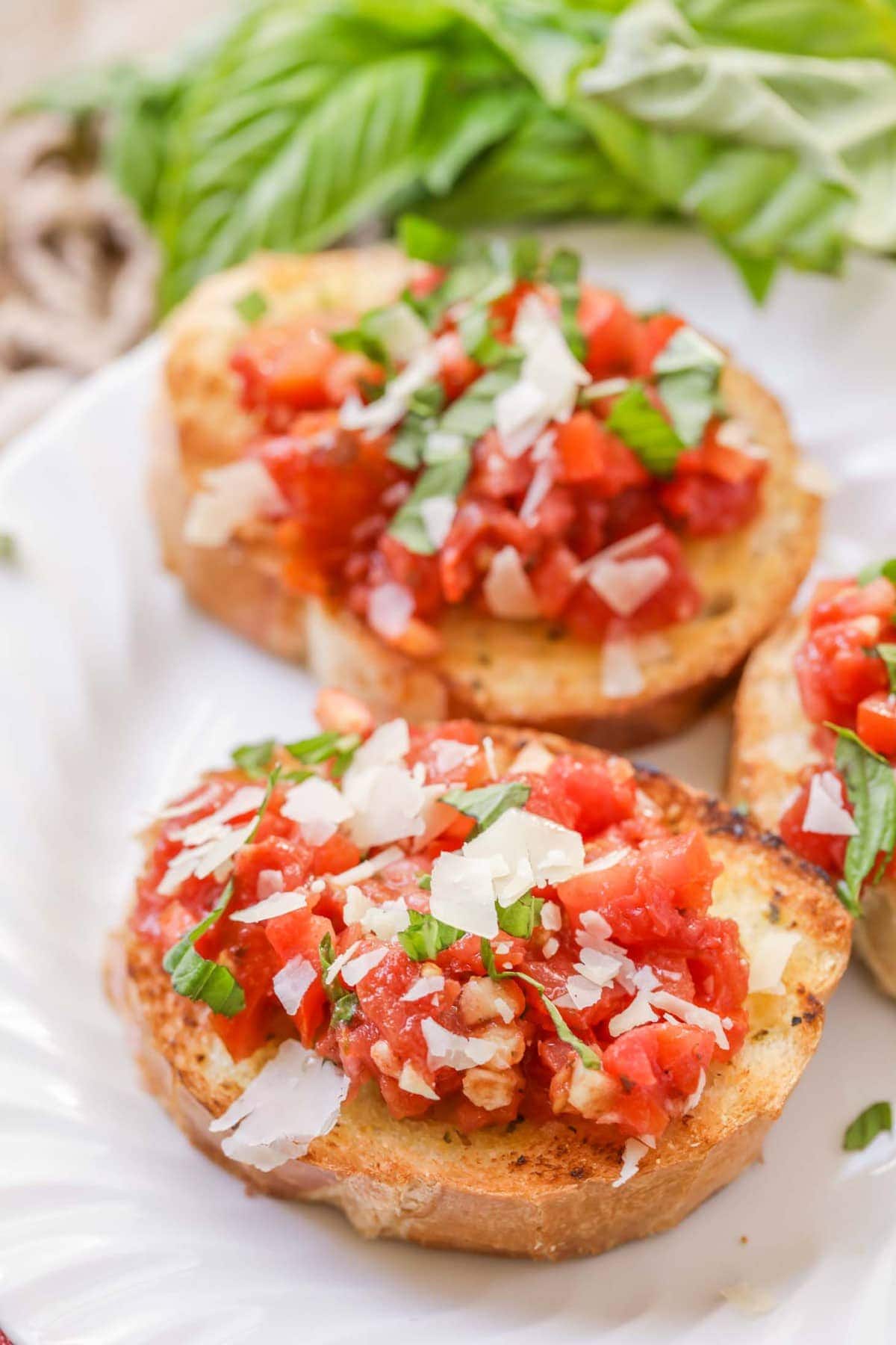 Easy Bruschetta Recipe served on a white plate.