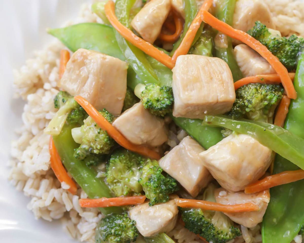 Chicken Breast Recipes - Close up of chicken stir fry and white rice.