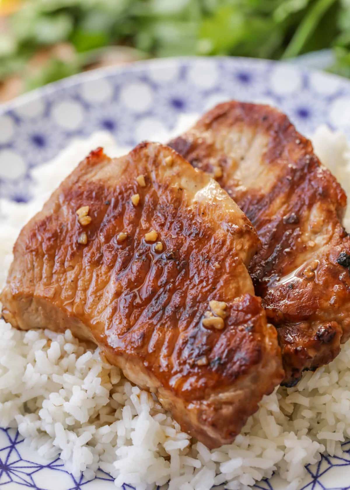 Teriyaki Pork Chops on a bed of rice.