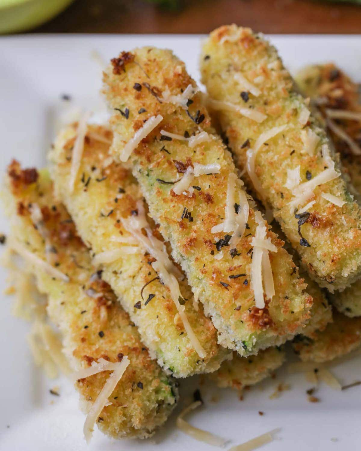 Zucchini Fries recipe - stacked on white plate
