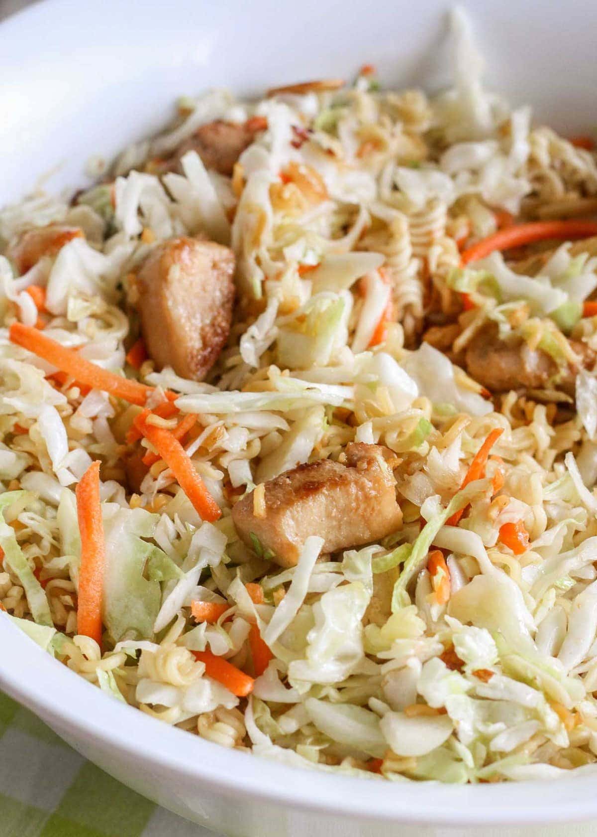 close up of Ramen Noodle Coleslaw in a white bowl