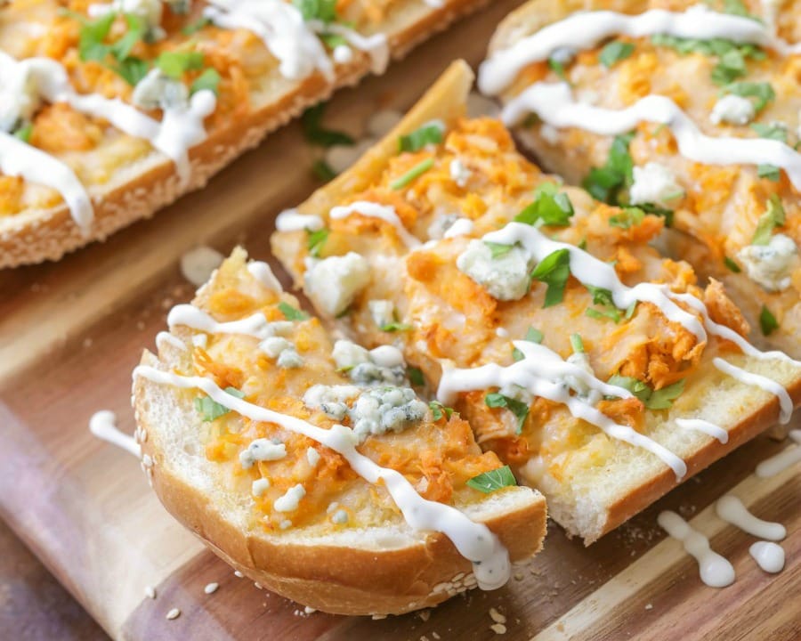 Buffalo Chicken french Bread sliced and topped with bleu cheese