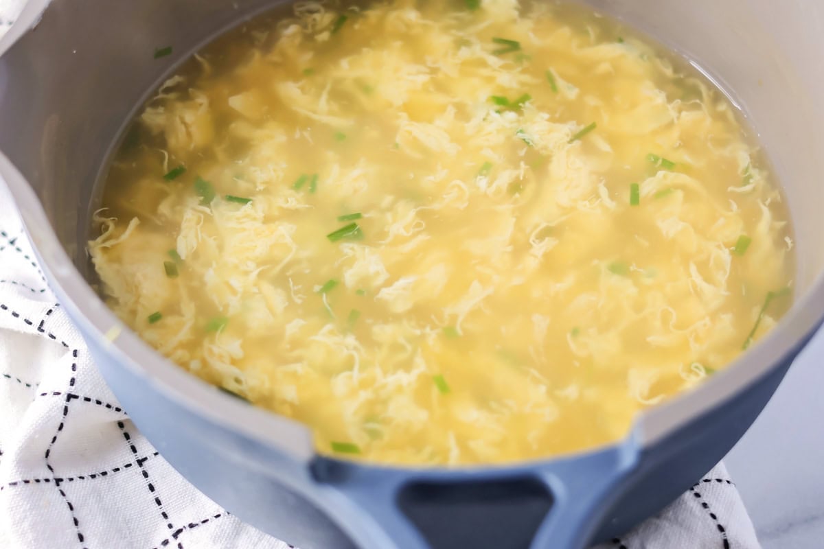 Egg drop soup in pot.
