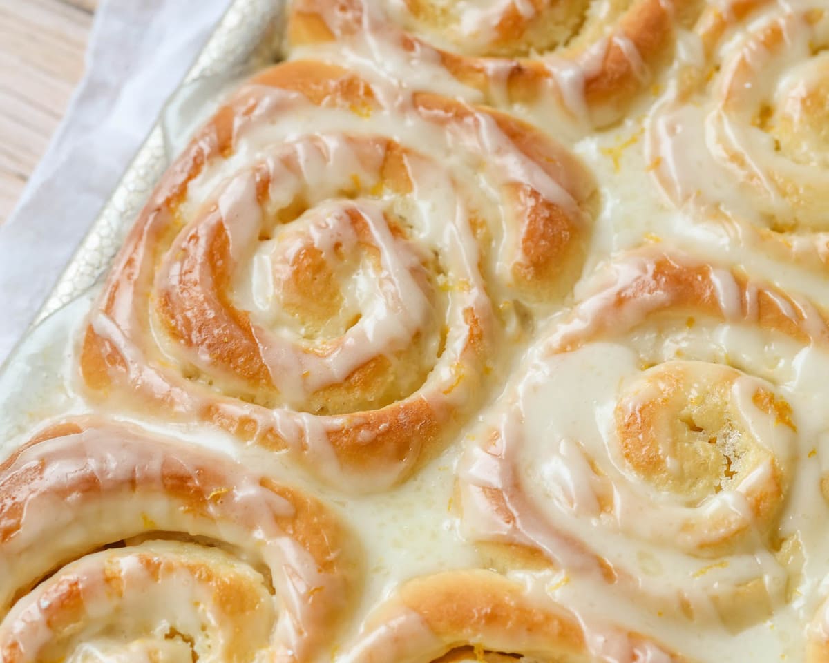 Breakfast for dinner - baking dish filled with iced orange rolls.