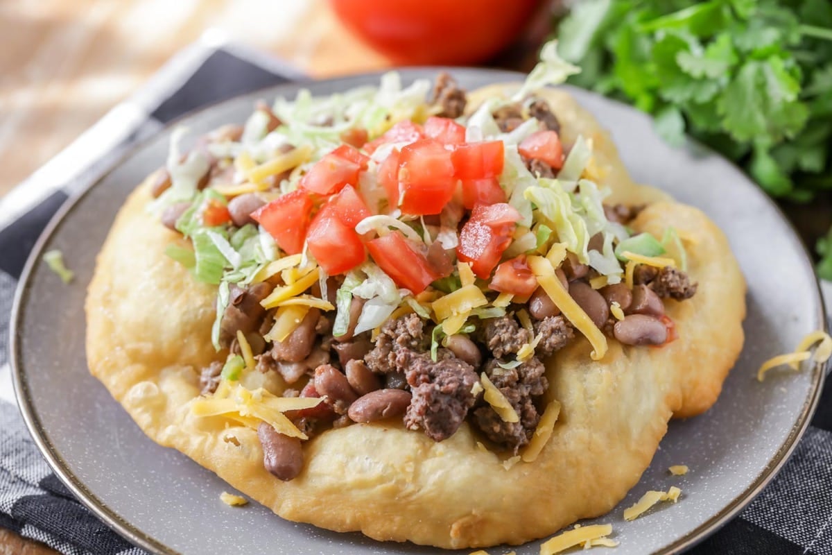 Fall dinner ideas - Indian fry bread topped with beans, meat, and veggies.