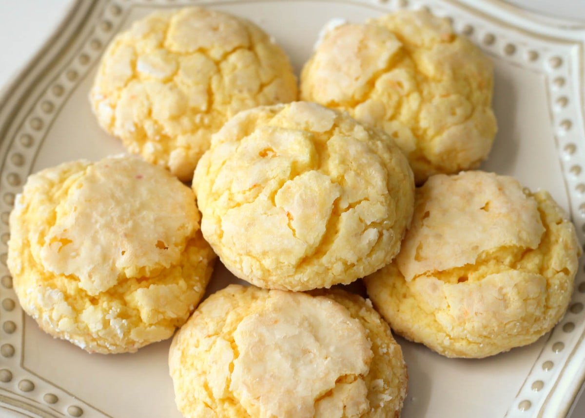 Easy cookie recipes - gooey butter cookies piled on a white plate.