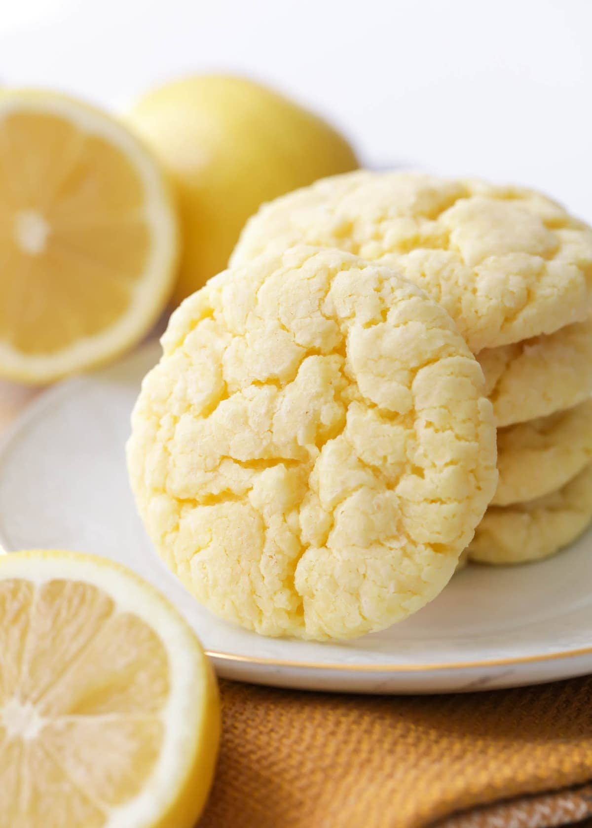 lemon crinkle cookies on a white plate