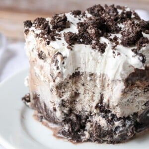 Oreo ice cream cake with a bite missing.