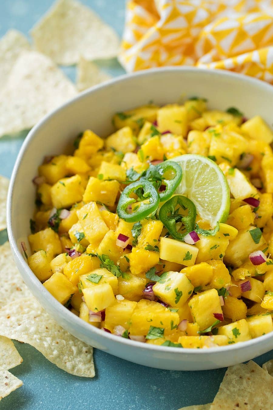 Close up of Mango Salsa recipe topped with slice jalapenos.