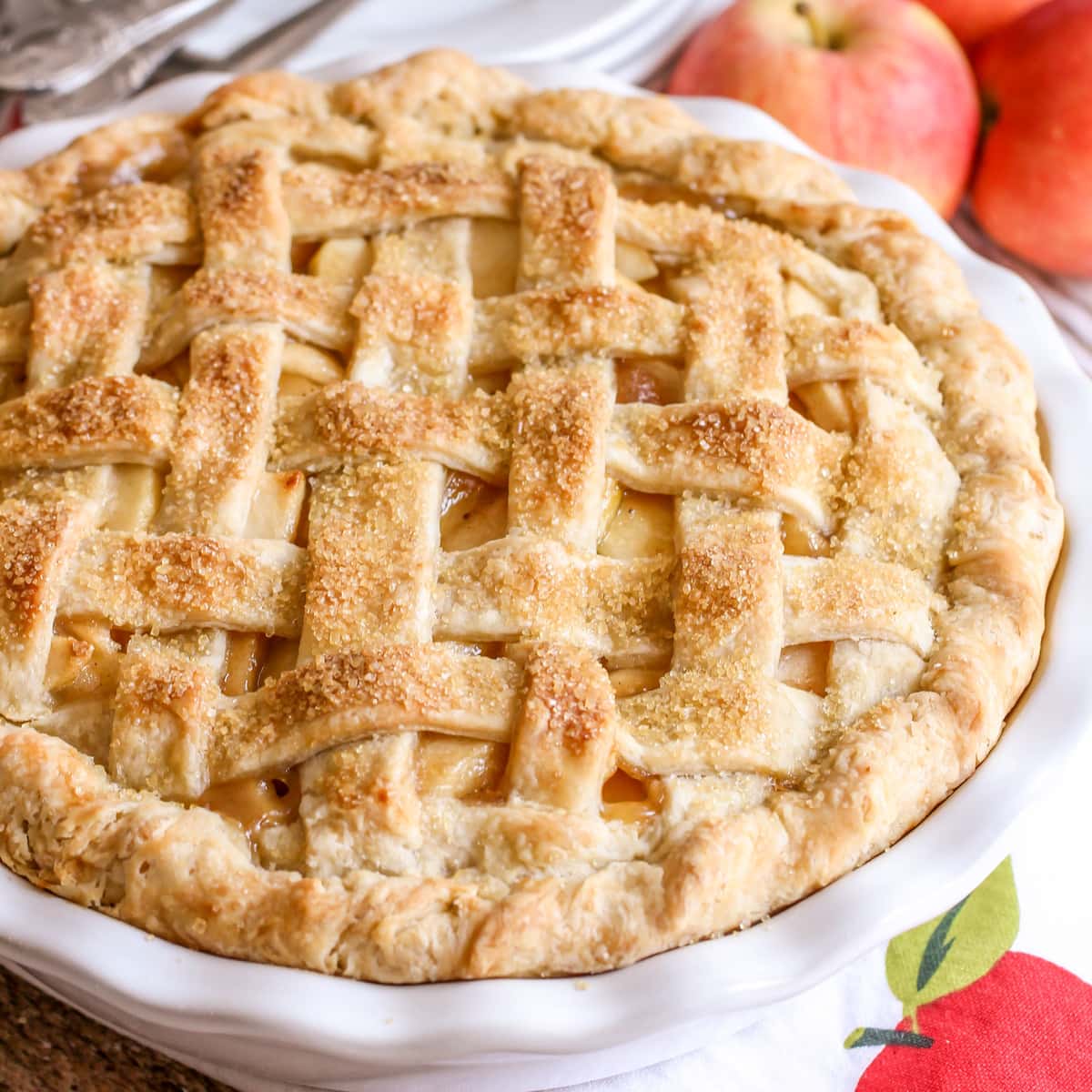 4th of July Desserts - Apple pie with a lattice crust in a white pie dish.