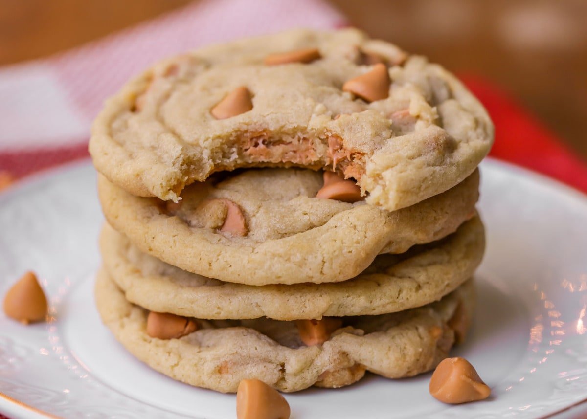 Butterscotch Cookies stacked on a white plate.