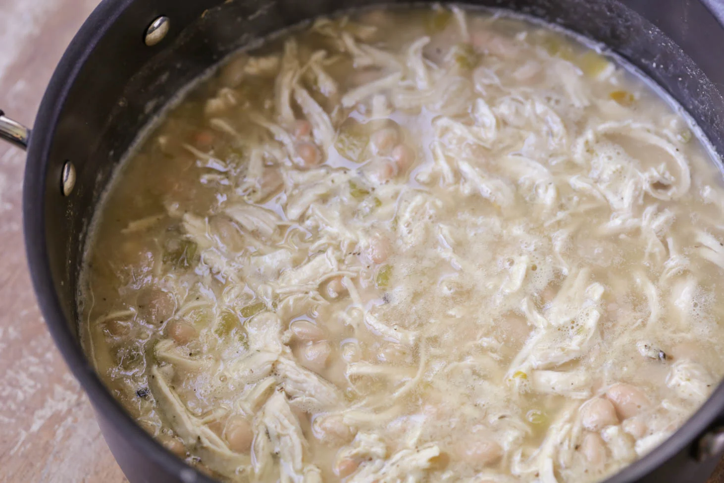 White Bean Chicken Chili cooking in pot.