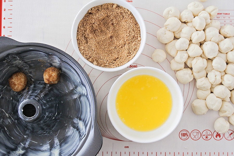 Dough balls and ingredients for easy monkey bread