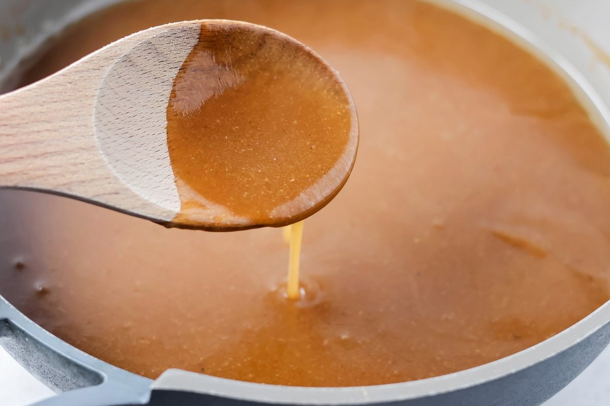 Pot roast gravy in pan.
