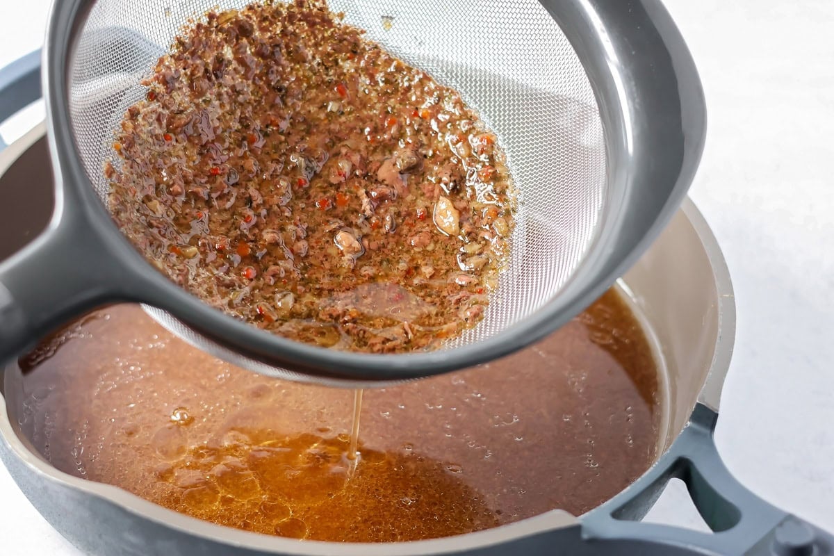 Making gravy with roast juices.