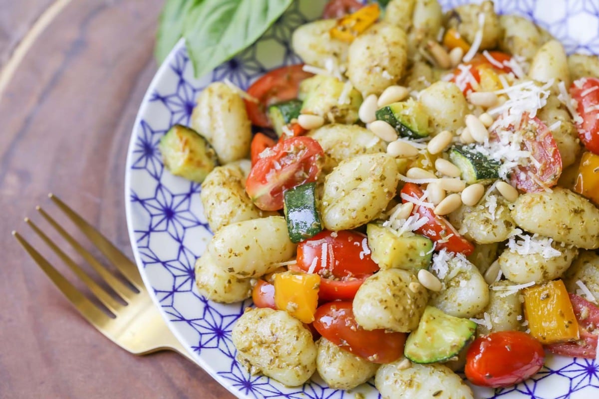 Pesto Gnocchi in a what and blue bowl